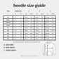 The image is a size guide for a hoodie, providing measurements for different dress sizes and sleeve lengths.