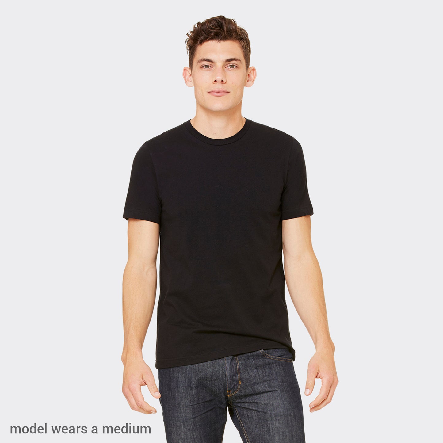 a man in a black t - shirt and jeans